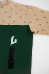 Green and beige long-sleeve shirt with logo on a white background