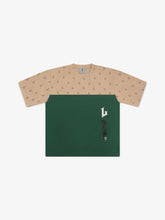 Two-tone shirt with beige sleeves and green front on a white background